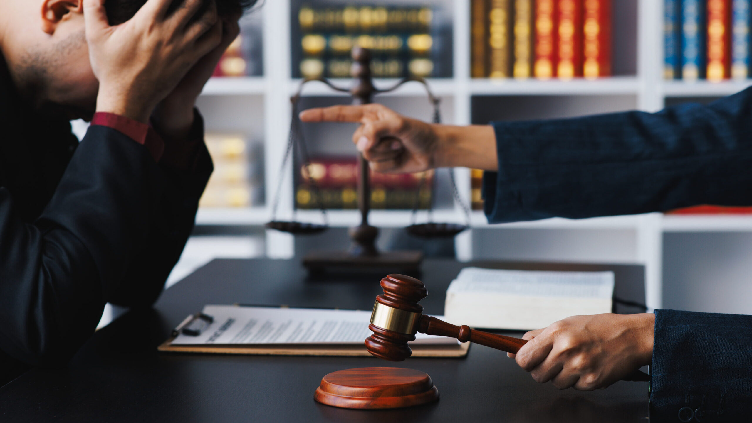 lawyer working with upset male client in office and talking with